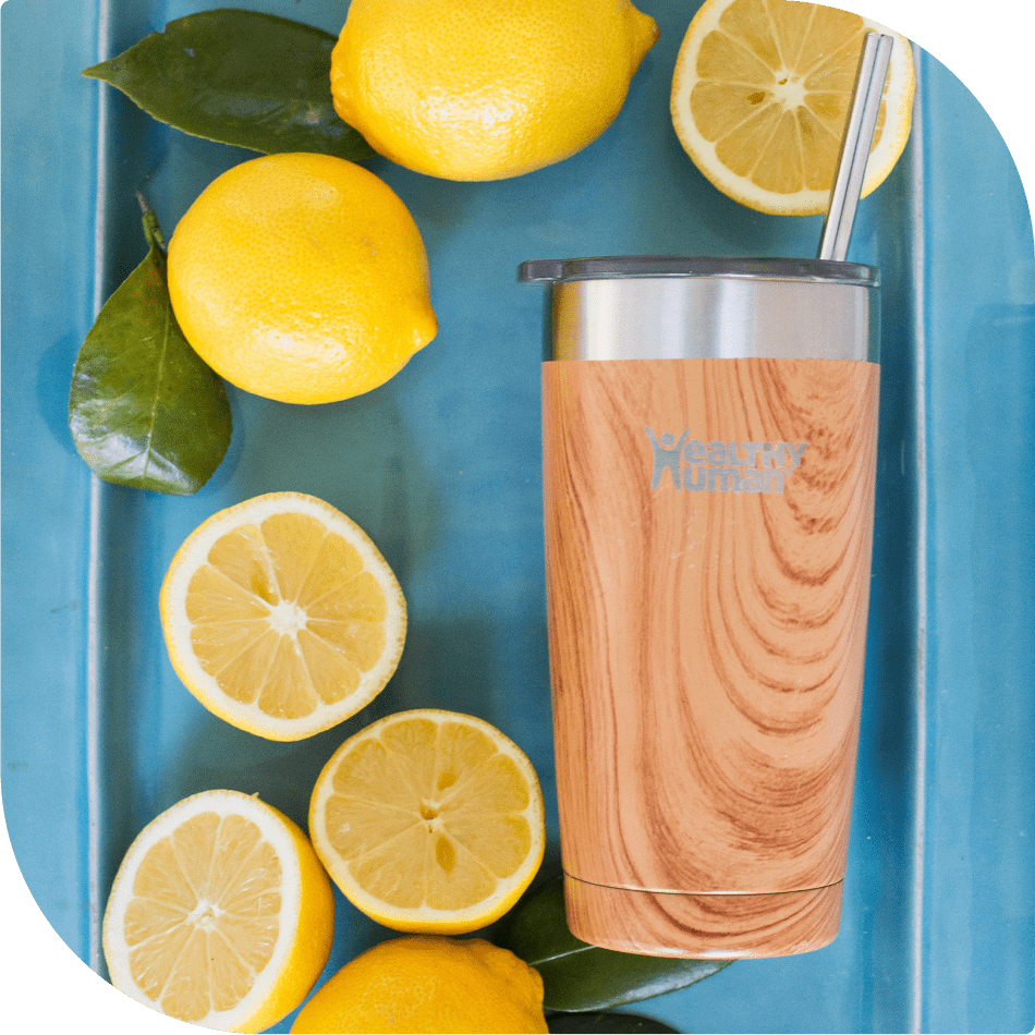 Bottle Surrounded by Lemons - Refreshing Citrus Vibes